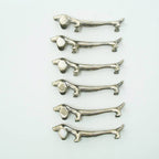 Silver-plated dachshund knife rests