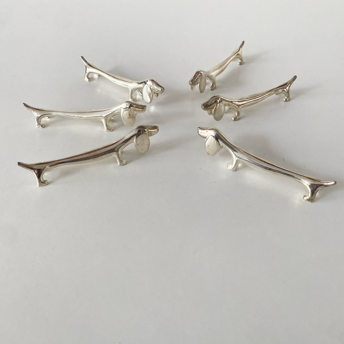 Porte-couteaux teckels en métal argenté