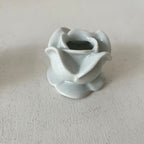 Pair of porcelain flower candlesticks