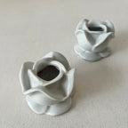 Pair of porcelain flower candlesticks