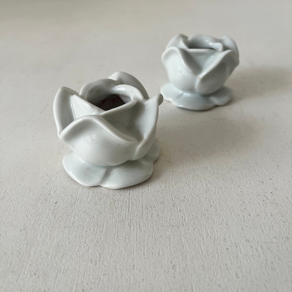 Pair of porcelain flower candlesticks