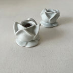 Pair of porcelain flower candlesticks